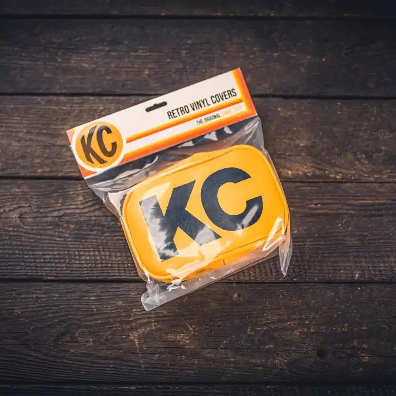 KC HiLiTES Retro 5in x 7in Rectangular Yellow Vinyl Light Cover w/ Black KC Logo (Pair) Order Now