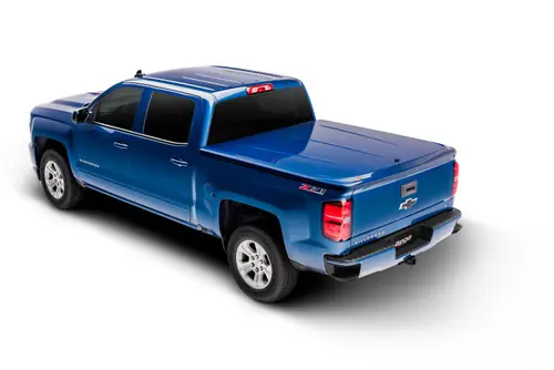 Get Yours UnderCover 2016-2023 Toyota Tacoma 5ft Lux Bed Cover - Inferno (Req Factory Deck Rails)